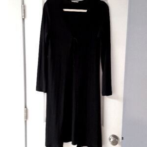 Conteporary lightweight over sweater midi length poly